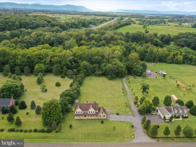 an aerial view of a golf course with a garden