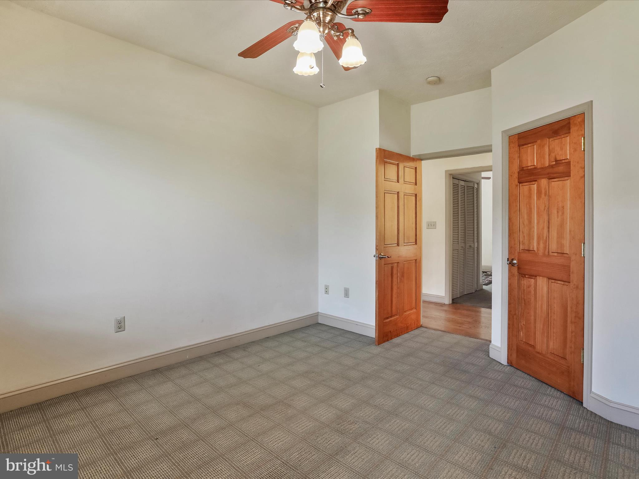 15 Rachels Ln Road Front Royal, VA 22630 - Photo 26 of 73 an empty room with closet and a chandelier fan