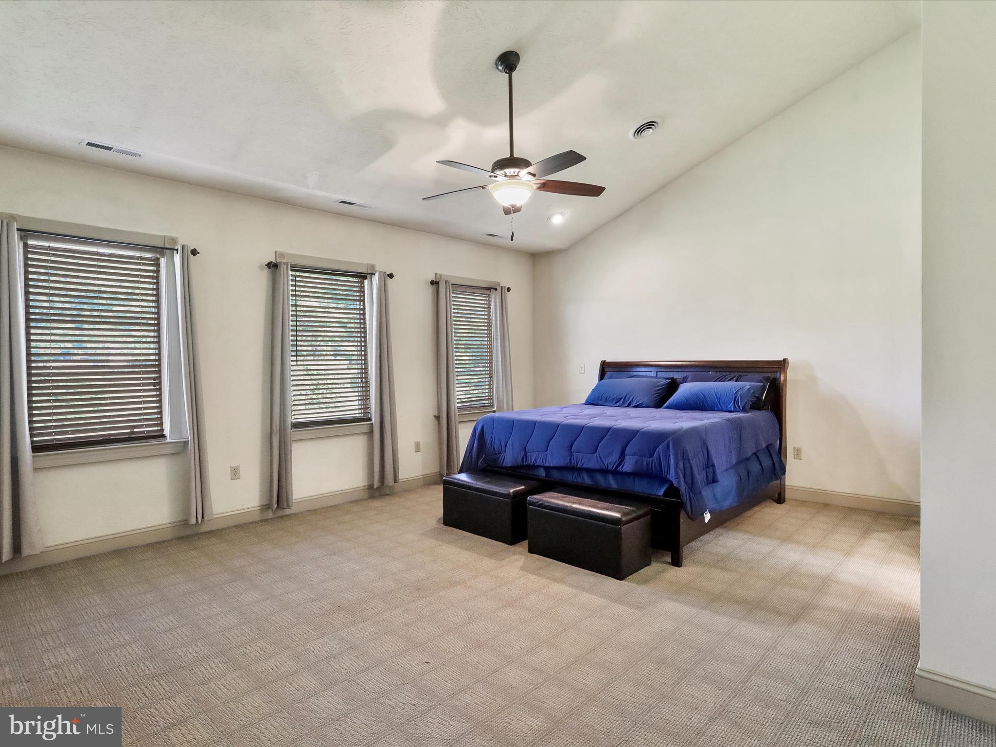 15 Rachels Ln Road Front Royal, VA 22630 - Photo 32 of 73 a spacious bedroom with a bed dresser and a window