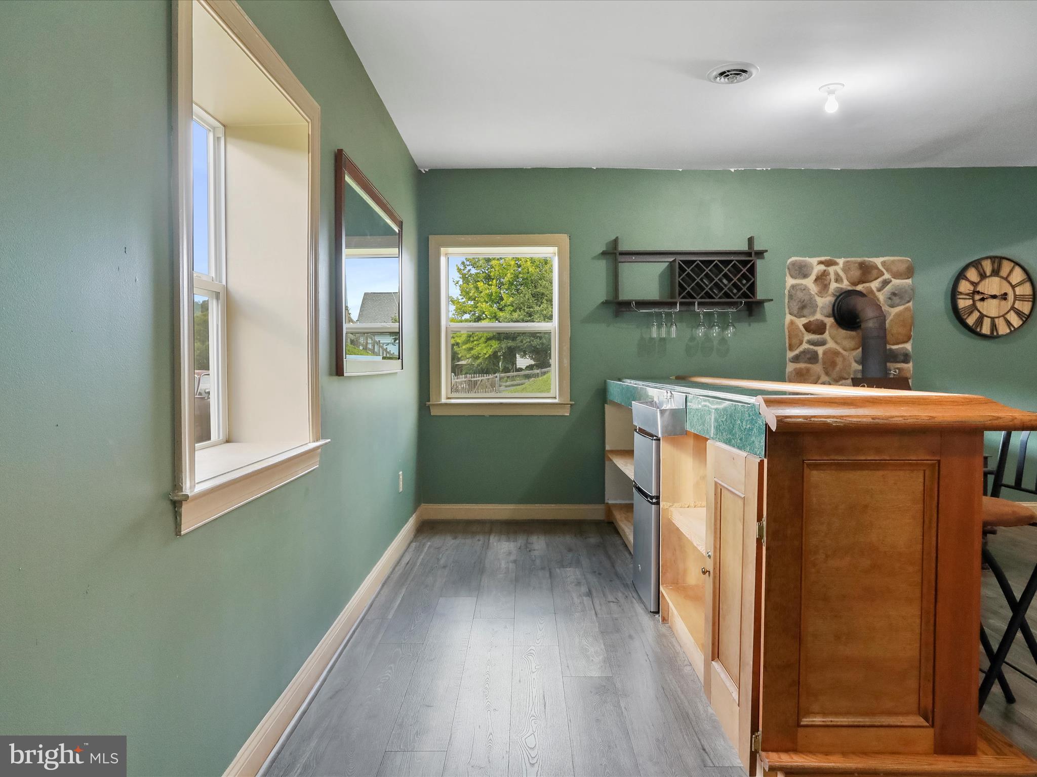 15 Rachels Ln Road Front Royal, VA 22630 - Photo 41 of 73 a view of a kitchen with fridge and wooden floor