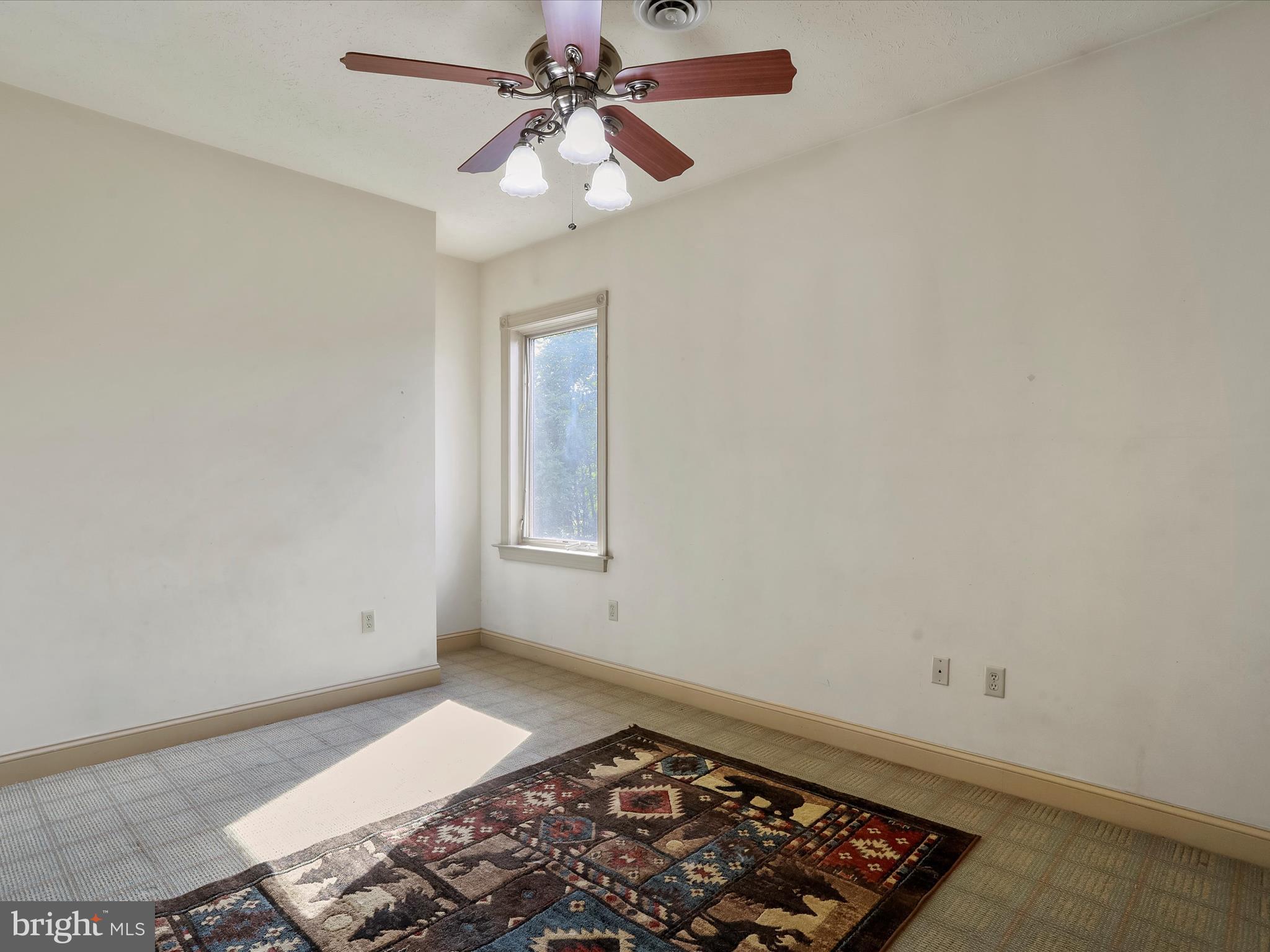 15 Rachels Ln Road Front Royal, VA 22630 - Photo 8 of 73 an empty room with fan and a window