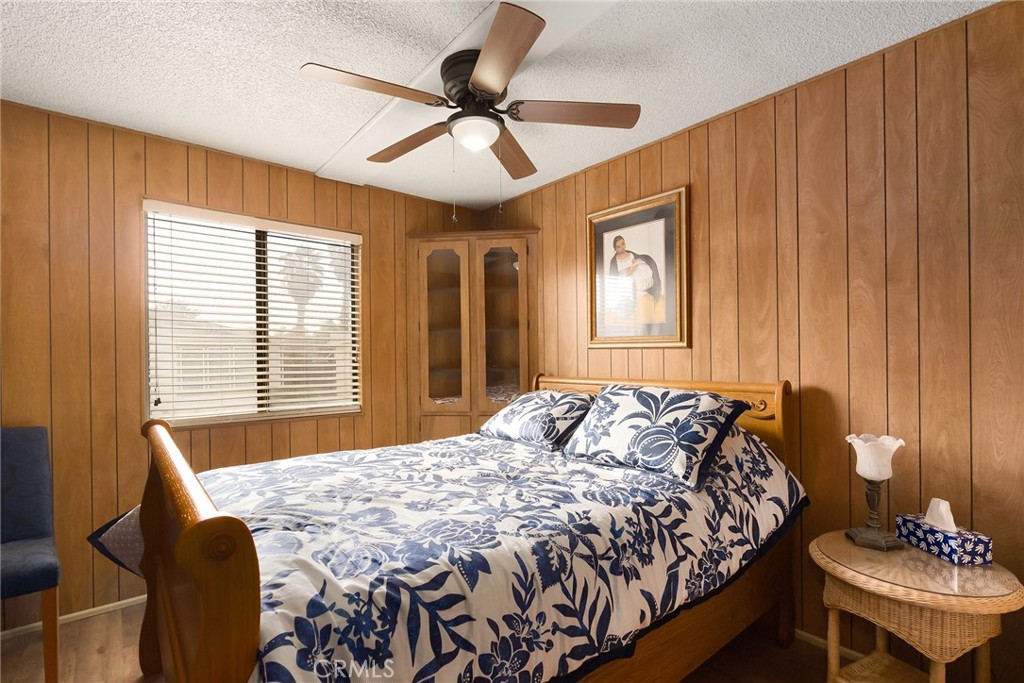 3835 Gardiner Ferry Road, Unit 2 Corning, CA 96021 - Photo 20 of 51 a bedroom with a bed and a table