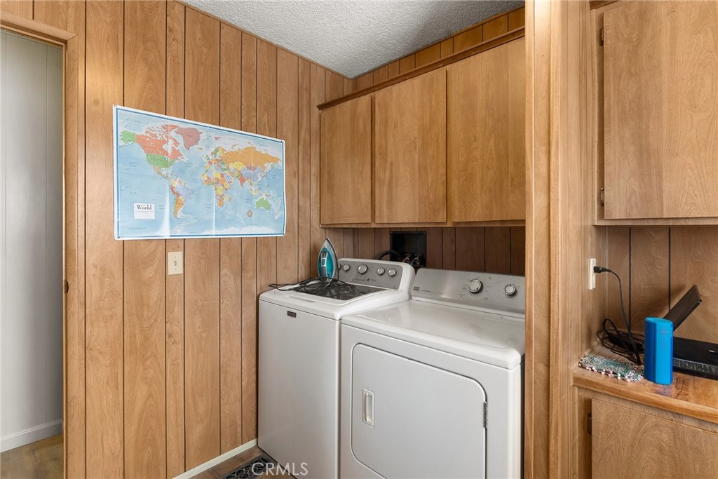 3835 Gardiner Ferry Road, Unit 2 Corning, CA 96021 - Photo 23 of 51 a view of storage and utility room with washer and dryer