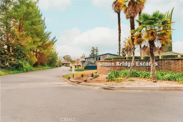 a sign that is on the side of a street