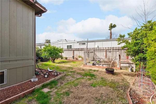 a house view with a backyard space