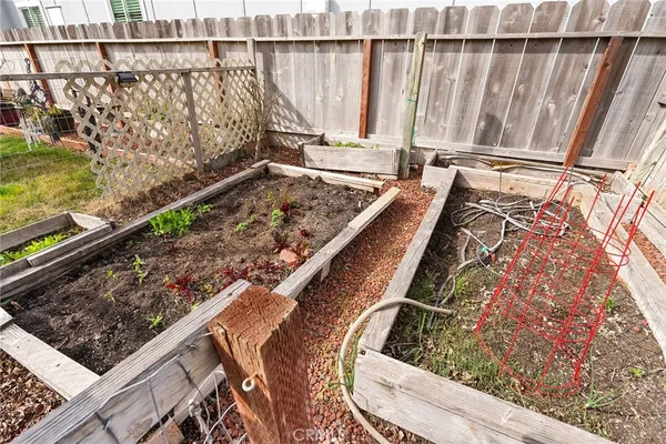 a view of a house with a iron gate