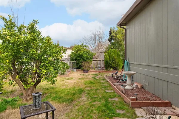 a backyard of a house with lots of green space