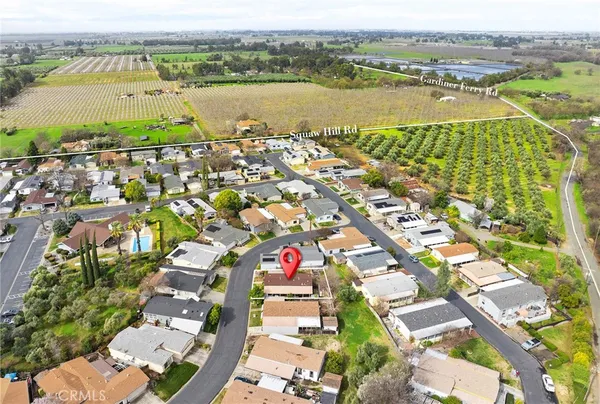 an aerial view of a city with lake view