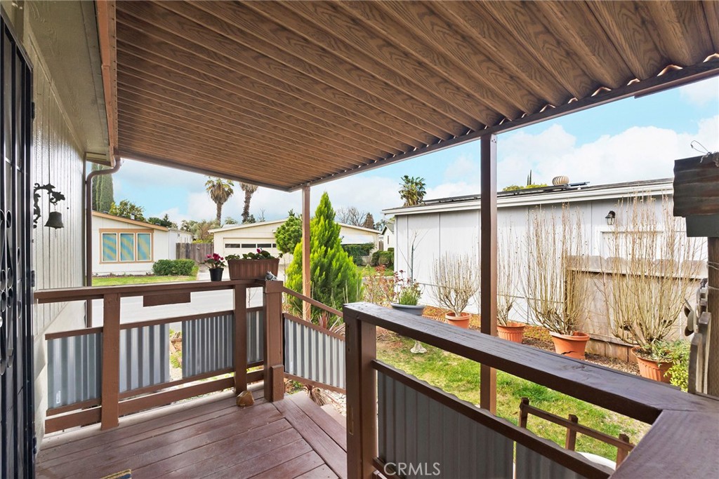 3835 Gardiner Ferry Road, Unit 2 Corning, CA 96021 - Photo 8 of 51 a view of an chairs and table in the balcony