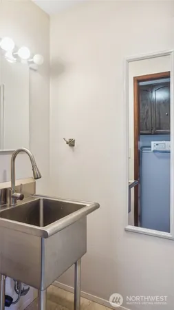 a bed room with a bed and a window
