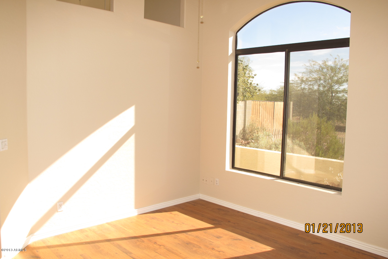 525 South Boyd Road Apache Junction, AZ 85119 - Photo 13 of 39 a view of an empty room with a window