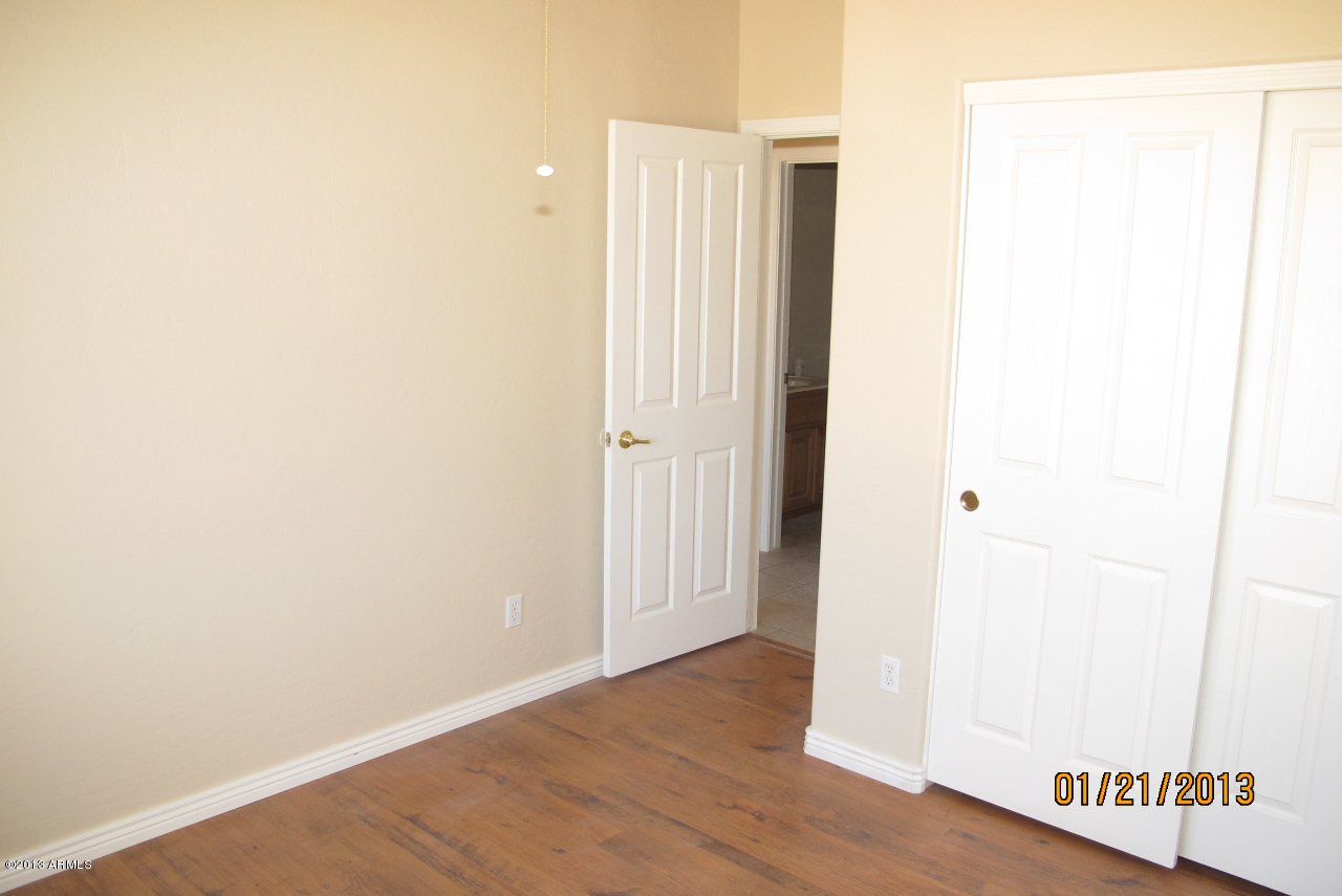525 South Boyd Road Apache Junction, AZ 85119 - Photo 24 of 39 a view of a room with wooden floor