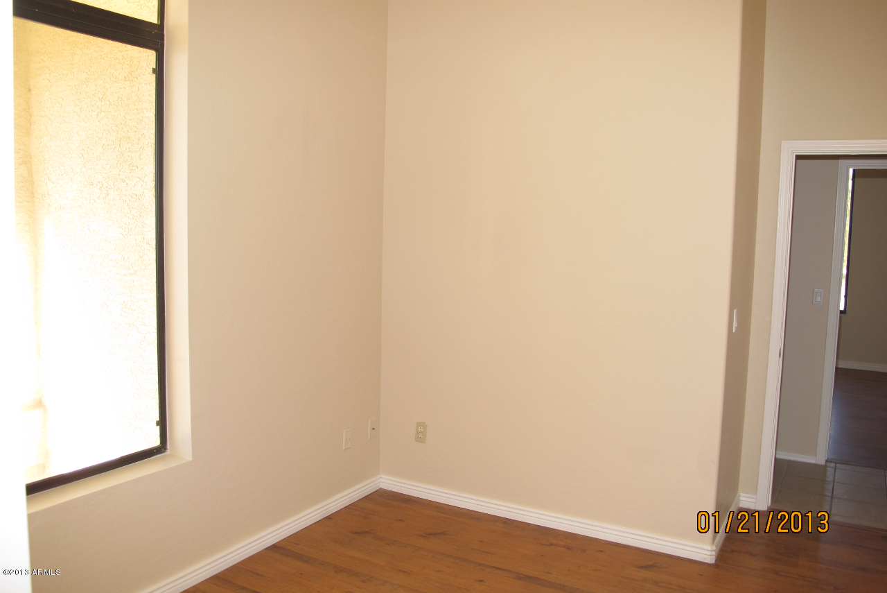 525 South Boyd Road Apache Junction, AZ 85119 - Photo 7 of 39 a view of a small space with wooden floor