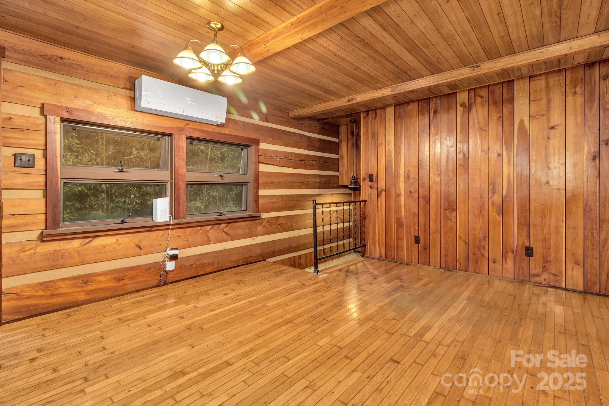 200 Dry Branch Road Marshall, NC 28753 - Photo 13 of 38 a view of an empty room with a window