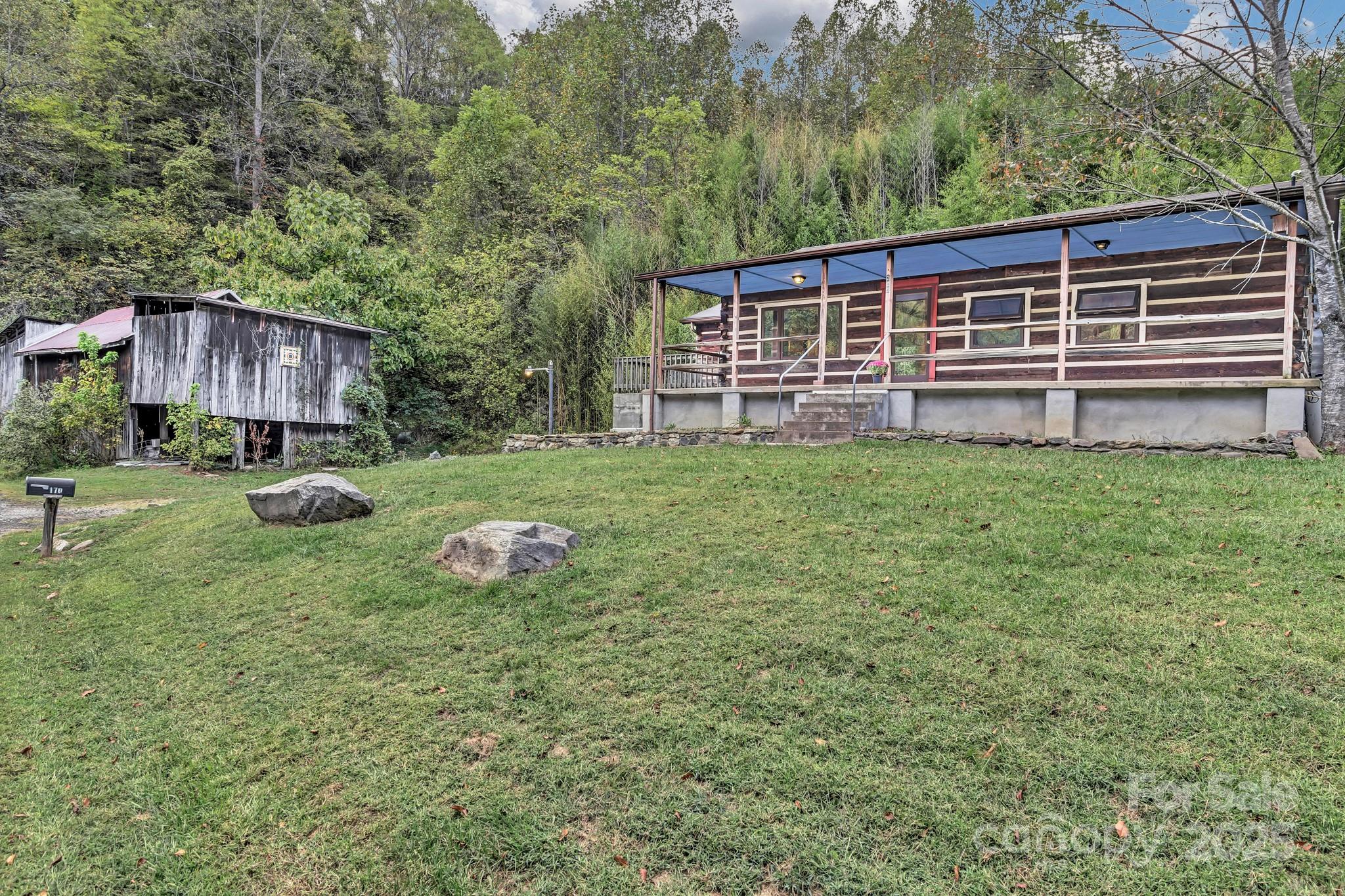 200 Dry Branch Road Marshall, NC 28753 - Photo 2 of 38 a view of a house with backyard and sitting area