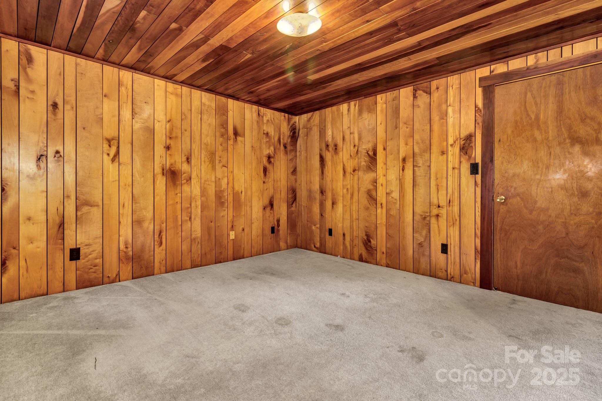 200 Dry Branch Road Marshall, NC 28753 - Photo 23 of 38 a view of an empty room with a window