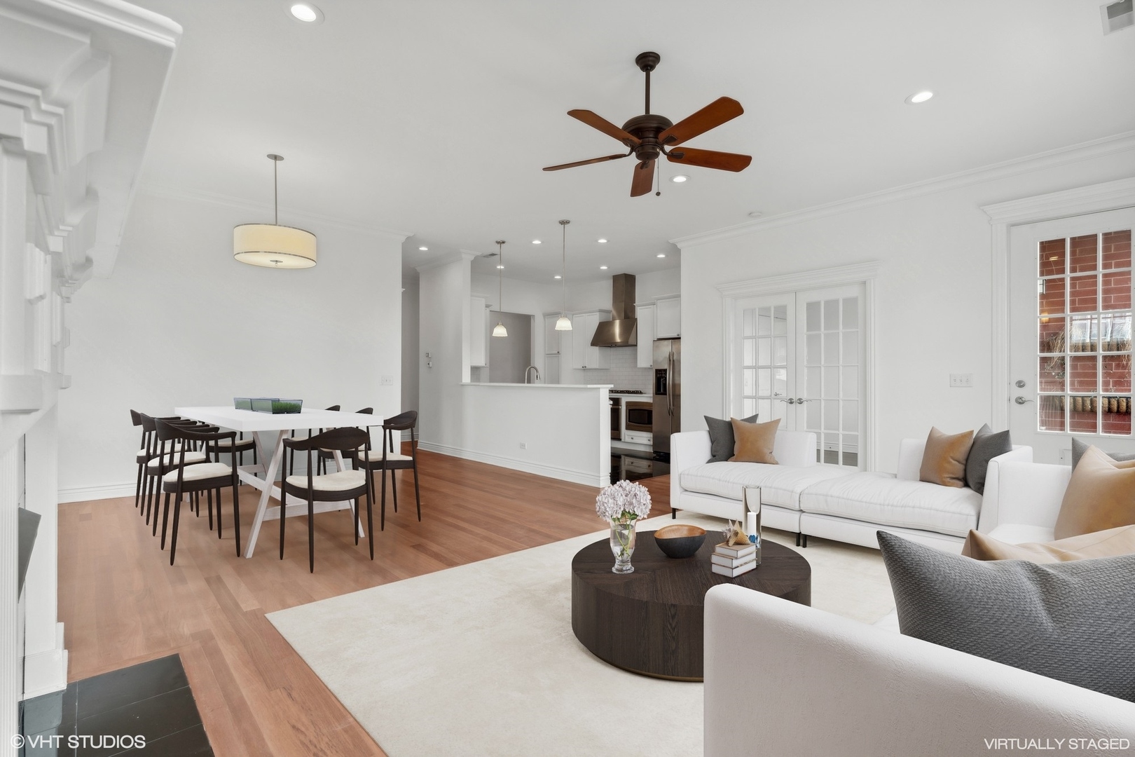 35 South Racine Avenue, Unit 4SW Chicago, IL 60607 - Photo 11 of 38 a living room with furniture kitchen view and a chandelier