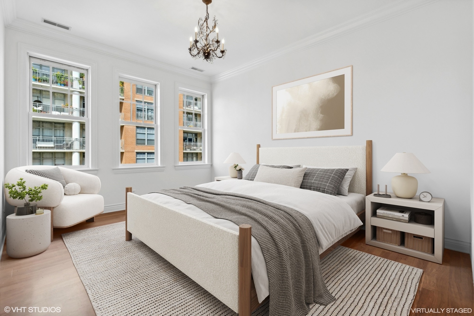 35 South Racine Avenue, Unit 4SW Chicago, IL 60607 - Photo 22 of 38 a bedroom with a bed and a chandelier