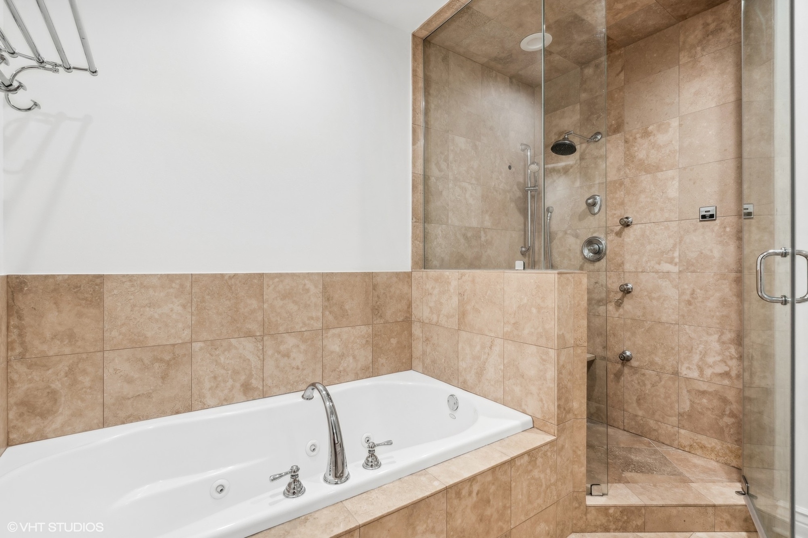 35 South Racine Avenue, Unit 4SW Chicago, IL 60607 - Photo 27 of 38 a bathroom with a bathtub and a shower