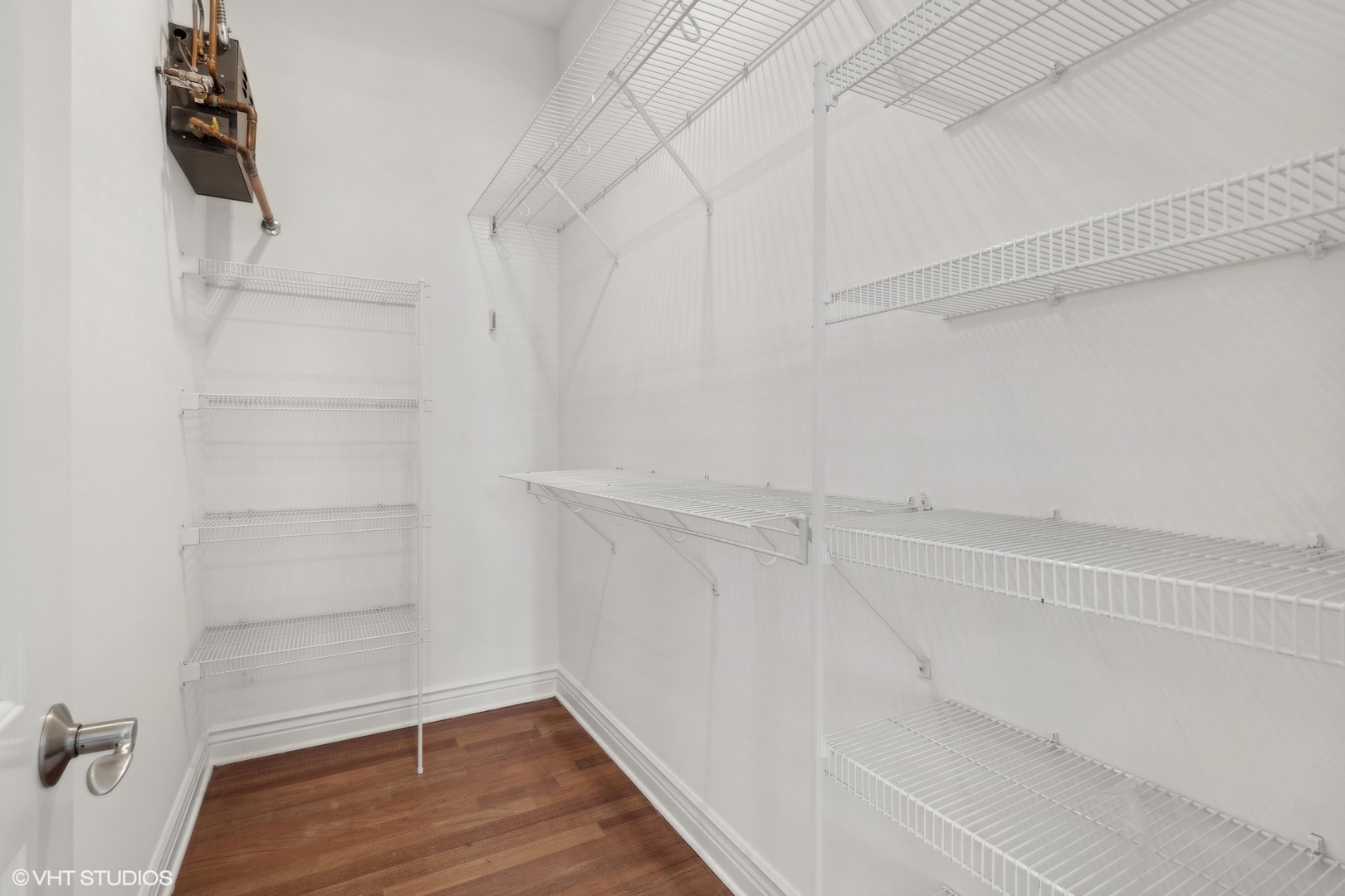 35 South Racine Avenue, Unit 4SW Chicago, IL 60607 - Photo 28 of 38 a view of a room with racks on the wall