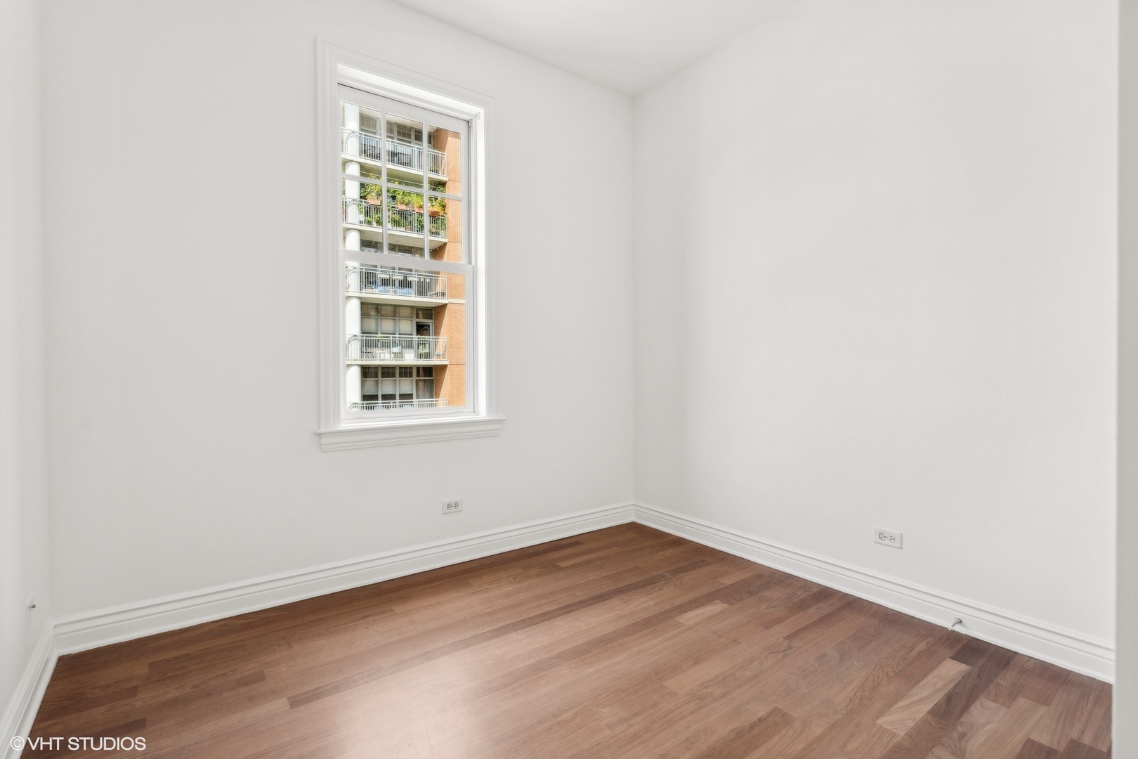 35 South Racine Avenue, Unit 4SW Chicago, IL 60607 - Photo 30 of 38 an empty room with a window