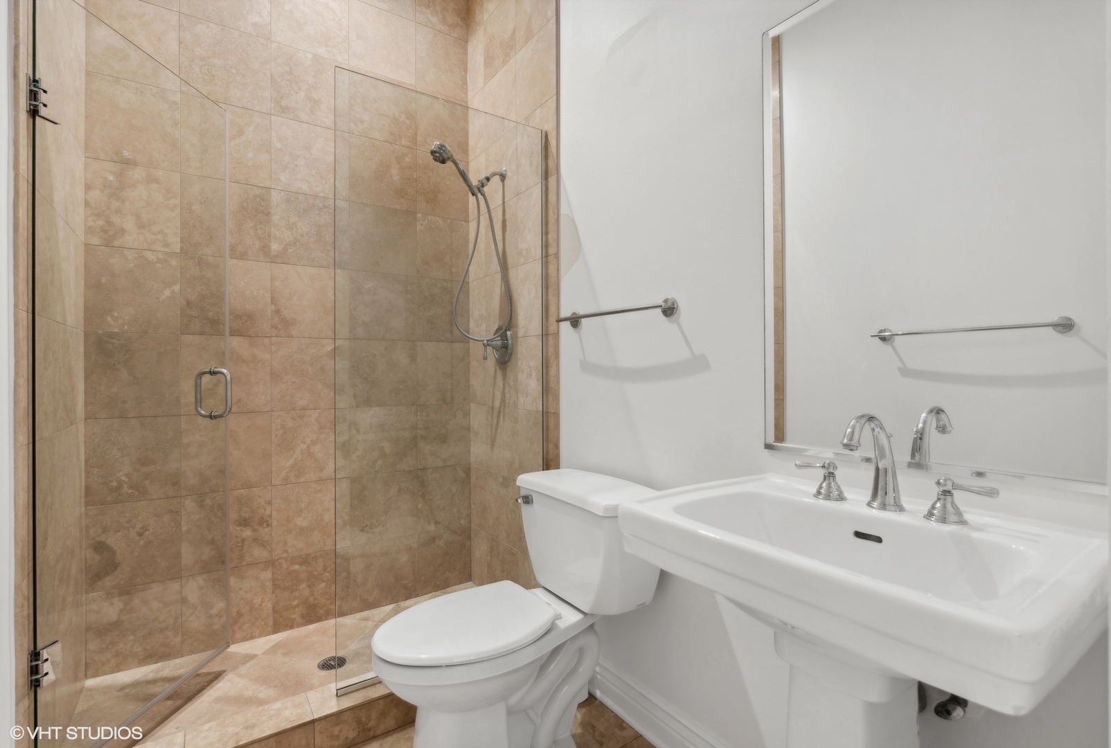 35 South Racine Avenue, Unit 4SW Chicago, IL 60607 - Photo 33 of 38 a bathroom with a sink a toilet and shower