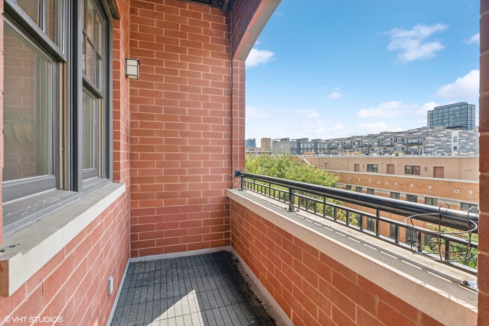35 South Racine Avenue, Unit 4SW Chicago, IL 60607 - Photo 34 of 38 a view of balcony with city view