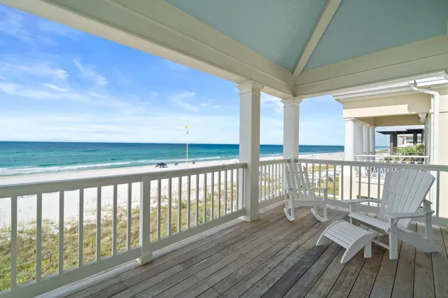 a view of balcony with wooden floor