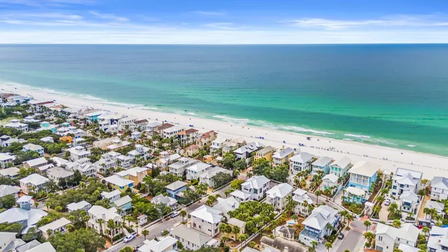 a view of a swimming pool with an outdoor seating