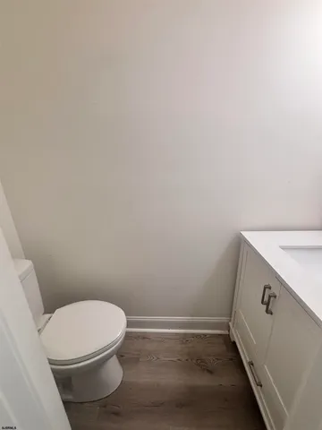 a bathroom with a toilet and a sink