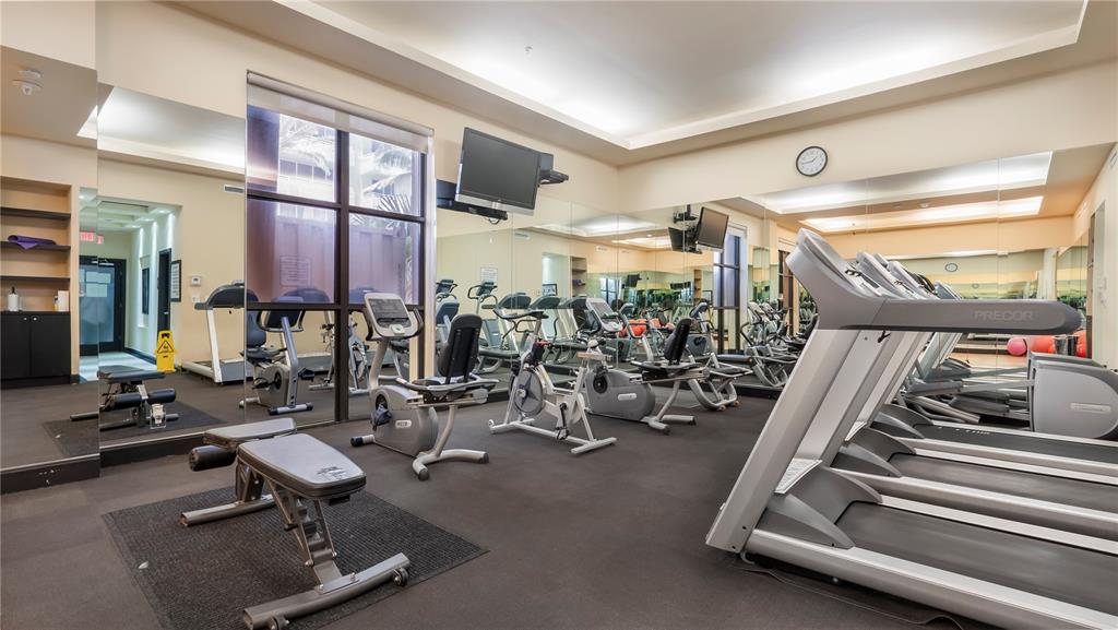 8877 Collins Avenue, Unit 1107 Surfside, FL 33154 - Photo 17 of 42 a view of a room with gym equipment