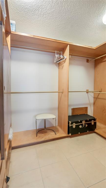 8877 Collins Avenue, Unit 1107 Surfside, FL 33154 - Photo 29 of 42 a view of storage and utility room with two windows