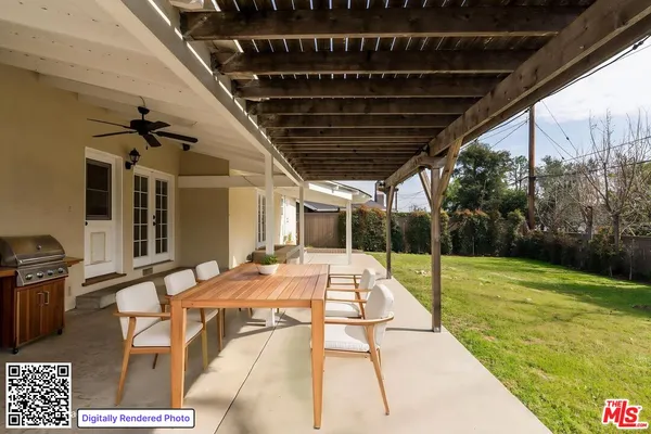 a view of swimming pool with seating area