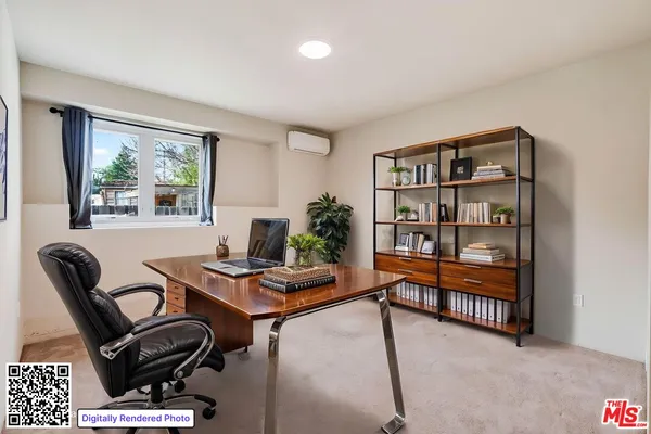 a workspace with furniture and window