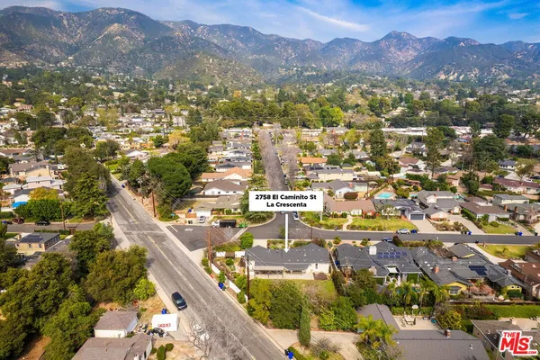 a view of city and mountain