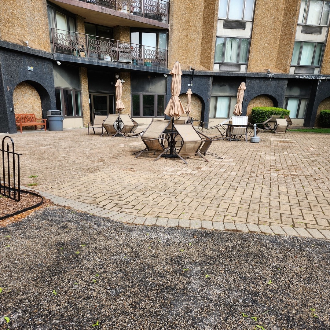 1 Renaissance Place, Unit 816 Palatine, IL 60067 - Photo 17 of 17 a view of a swimming pool with a lounge chairs