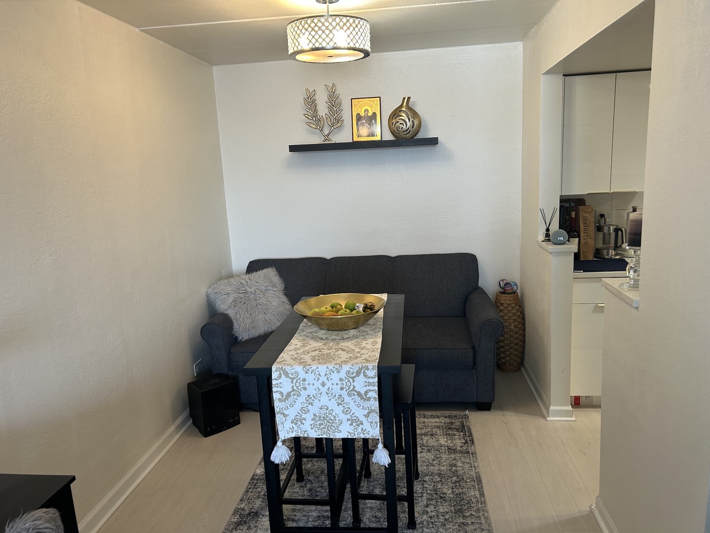 1 Renaissance Place, Unit 816 Palatine, IL 60067 - Photo 9 of 17 a living room with furniture and a table