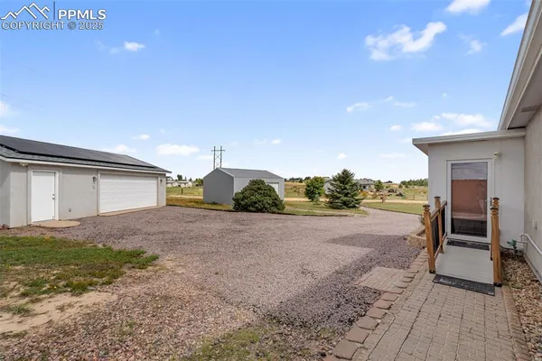 a view of a house with a patio
