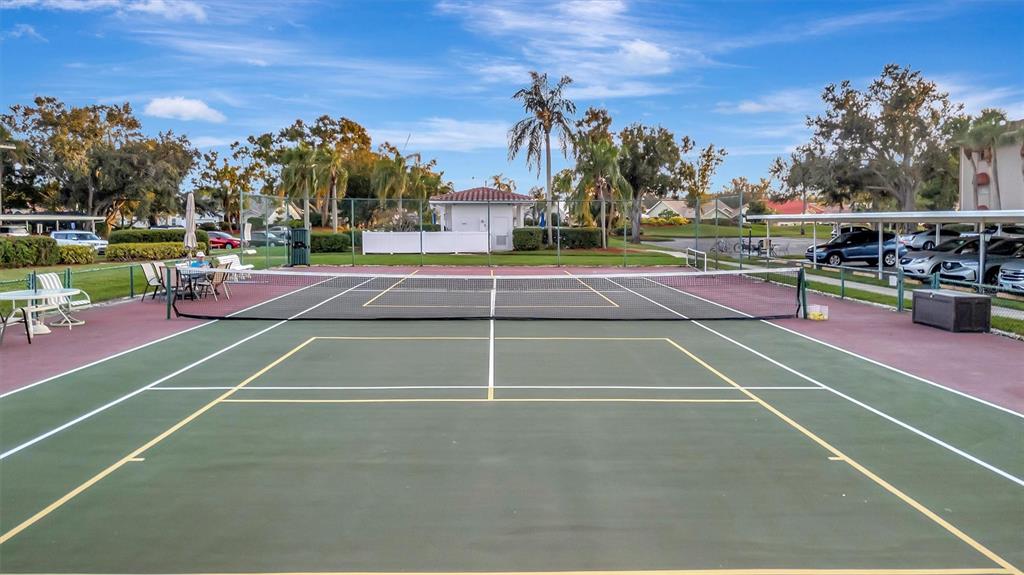 6507 Stone River Road, Unit 105 Bradenton, FL 34203 - Photo 11 of 62 a view of a tennis court
