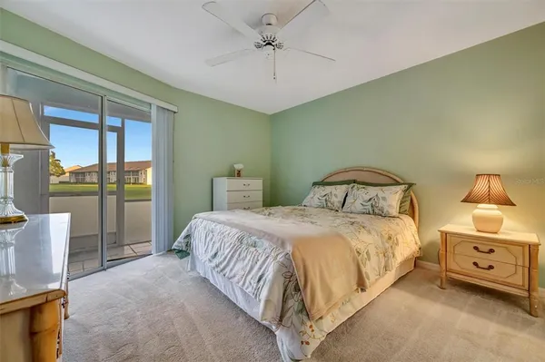 a view of a green field with clear sky