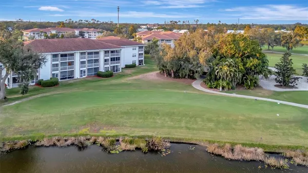 an aerial view of a house with a garden