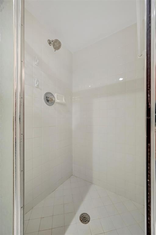 6507 Stone River Road, Unit 105 Bradenton, FL 34203 - Photo 52 of 62 a bathroom with a shower