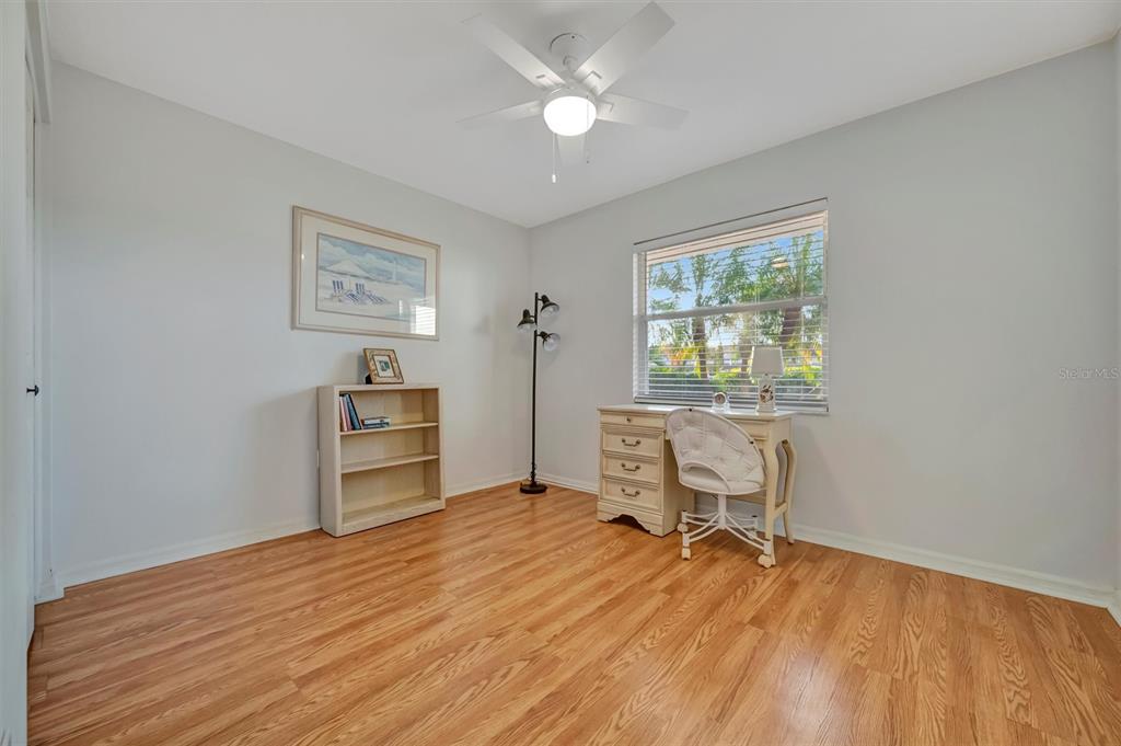 6507 Stone River Road, Unit 105 Bradenton, FL 34203 - Photo 54 of 62 a room with furniture and a window