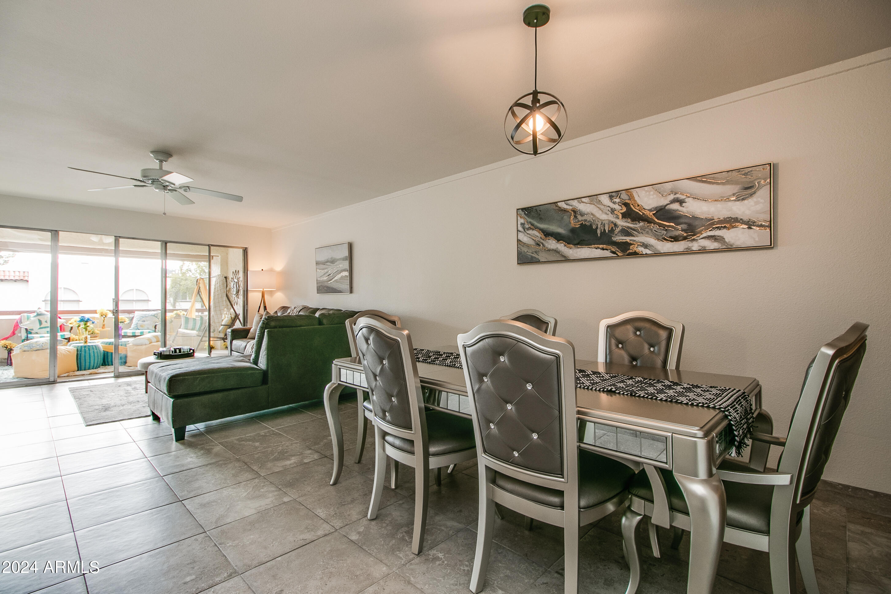 7625 East Camelback Road, Unit 252B Scottsdale, AZ 85251 - Photo 11 of 26 a view of a dining room with furniture window and outside view