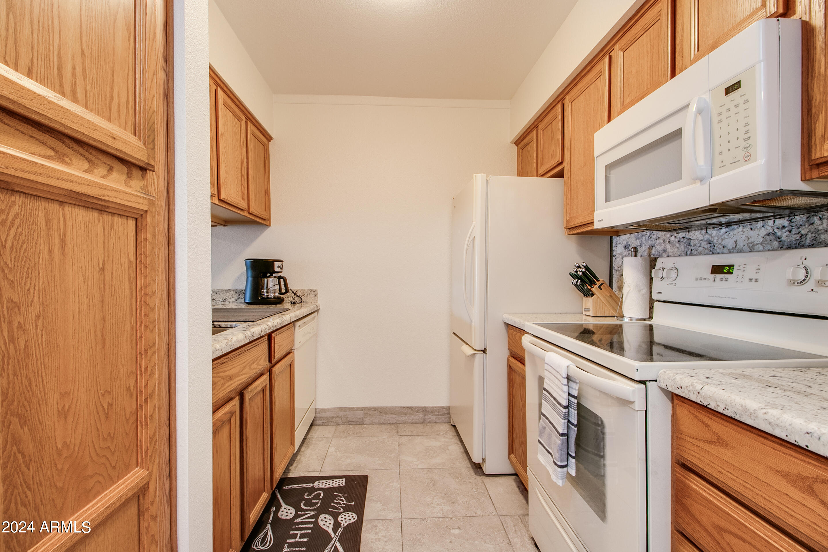 7625 East Camelback Road, Unit 252B Scottsdale, AZ 85251 - Photo 8 of 26 a utility room with dryer and washer