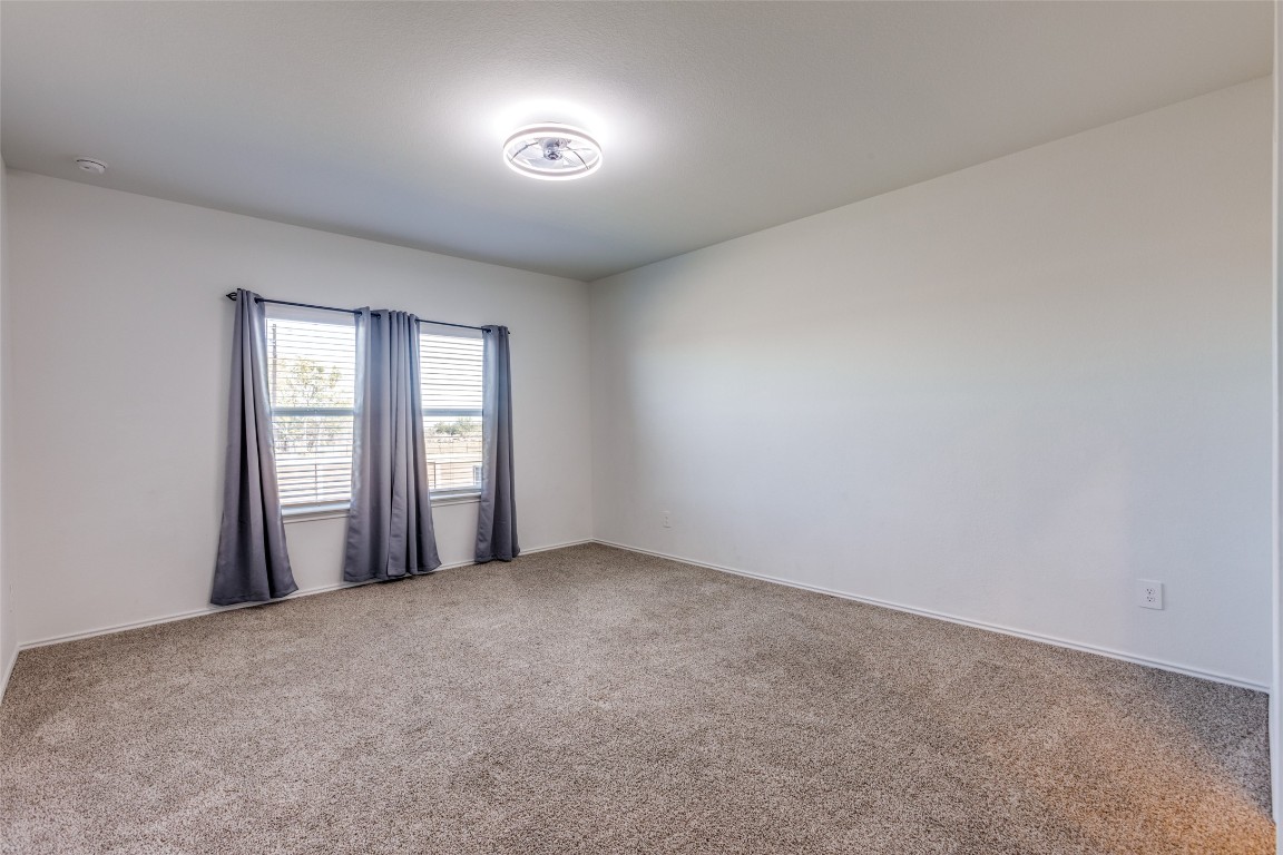 543 Sandringham Loop Kyle, TX 78640 - Photo 10 of 20 a view of a livingroom with a window