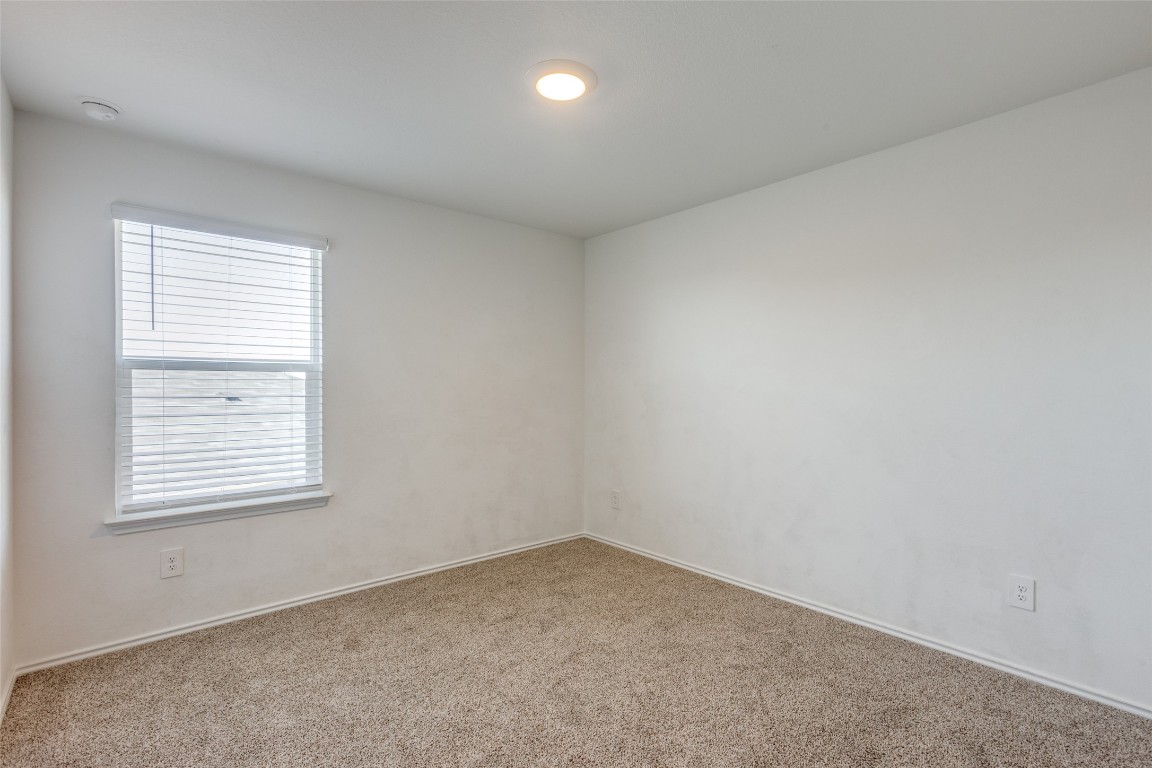 543 Sandringham Loop Kyle, TX 78640 - Photo 15 of 20 an empty room with a window