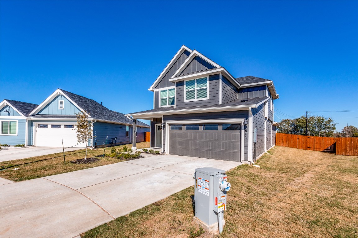 543 Sandringham Loop Kyle, TX 78640 - Photo 2 of 20 a front view of a house with a yard