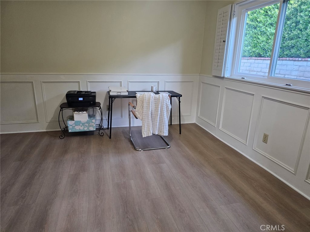 25132 Highspring Avenue Newhall, CA 91321 - Photo 18 of 46 a view of garage with furniture and window