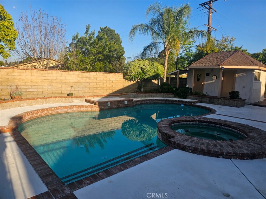 25132 Highspring Avenue Newhall, CA 91321 - Photo 34 of 46 a view of a house with a yard
